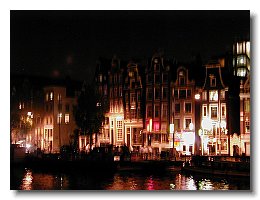Amstel canal houses at night